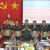 Vietnamese, Lao young officers promote exchanges