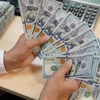 Reference exchange rate down 16 VND on July 26