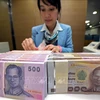 Thai central bank raises interest rate to 9-year high