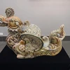 Ceramic works on sacred animals on display in Hanoi