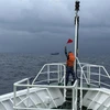 Fishing boat in distress towed to Song Tu Tay island