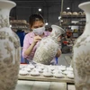 Online sale now irreversible for Hanoi’s craft villages: Insiders