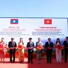 Vietnamese corporation presents apartment building to Lao province