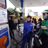 Petrol prices drop over 370 VND per litre