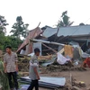 Indonesia floods, landslide kill 19, seven missing