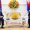 Cambodia, Laos vow to boost bilateral ties