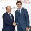 Prime Minister Nguyễn Xuân Phúc meets with his Canadian PM at G20