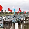 Flag-raising ceremony marks National Reunification Day