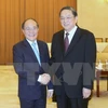 Titular parlamentario vietnamita dialoga con líder de organización china de masas