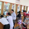 Hoa Binh adopta medidas para animar participación de pobladores en seguro de salud