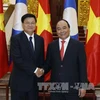 Vietnam y Laos determinados a preservar y desarrollar sus relaciones