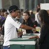 Mayoría de los tailandeses indecisos de participar en referendo, según encuesta