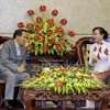 Ciudad Ho Chi Minh y Vientiane fortalecen cooperación entre organizaciones de masas