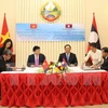 Firman Vietnam y Laos acuerdos de cooperación