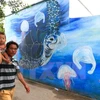 [Fotos] Pinturas murales ayudan a mejorar conciencia pública en isla vietnamitas 