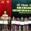 Conceden distinciones de Laos a combatientes voluntarios vietnamitas