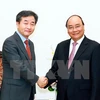 Premier de Vietnam recibe al presidente de Yonhap
