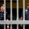 Arrestan en Malasia a policías vinculados con traficantes de drogas