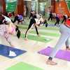 Día Internacional del Yoga se celebra en nueve localidades vietnamitas 