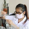 Vietnam y Laos buscan mejorar cooperación científica y tecnológica