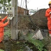 China asiste a Vietnam en recuperación de secuelas de tifón Damrey