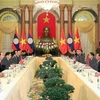 Presidente de Vietnam recibe a secretario general de PPRL y presidente de Laos