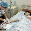 Vietnam busca aumentar cobertura de seguro de salud