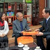 Presidente de Vietnam visita a intelectuales hanoyenses en ocasión del Tet