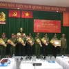 Policía de Ciudad Ho Chi Minh recibe la Orden de Desarrollo de Laos