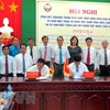 Organizaciones de masas de Vietnam y Laos coordinan divulgación sobre protección de frontera común