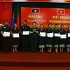 Vietnam y Laos cooperan en capacitación del personal sobre museografía