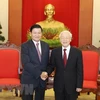 Máximo dirigente partidista recibe al premier laosiano en marco de FEM-ASEAN