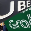 Grab y Uber sufren multa de cerca de 10 millones de dólares en Singapur