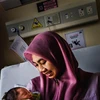 Malasia logra eliminar transmisión de VIH y sífilis de madre a hijo