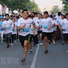 Nueve mil personas de 50 países y territorios corren en maratón en Ciudad Ho Chi Minh