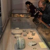 Exponen en Vietnam antigüedades recuperadas de barcos naufragados
