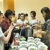 Actividad caritativa de mujeres de ASEAN en Indonesia