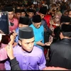 Miles de malasios participan en festividad islámica por el fin del Ramadán