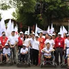 Cinco mil personas participan en una caminata en apoyo a víctimas de dioxina 