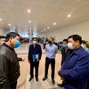 Inspeccionan prevención de COVID-19 en el aeropuerto internacional de Noi Bai