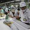 Industria textil de Camboya se esfuerza por enfrentar el COVID-19