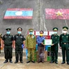 Guardia fronteriza vietnamita felicita a sus homólogos laosianos en ocasión del festival Bunpimay