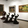 Exposición de pinturas de laca acapara atención del público en Hanoi