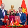 Vietnam y Dinamarca firman Acuerdo sobre asuntos laborales de familiares de miembros de diplomáticos