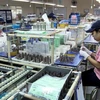 Empresas de inversión foránea aumentan su capital en industrias auxiliares de Vietnam