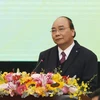 Sector financiero debe despertar fuerzas internas de Vietnam, según el Primer Ministro