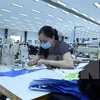 Nueva ola de COVID-19 genera inquietud entre fabricantes textiles de Vietnam