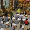 Vietnamitas residentes en Laos oran por la paz y prosperidad