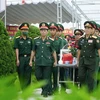 Realizan en Vietnam acto de entierro de soldados caídos en Laos