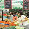 Inflación en Vietnam sigue bajo control, según economistas 